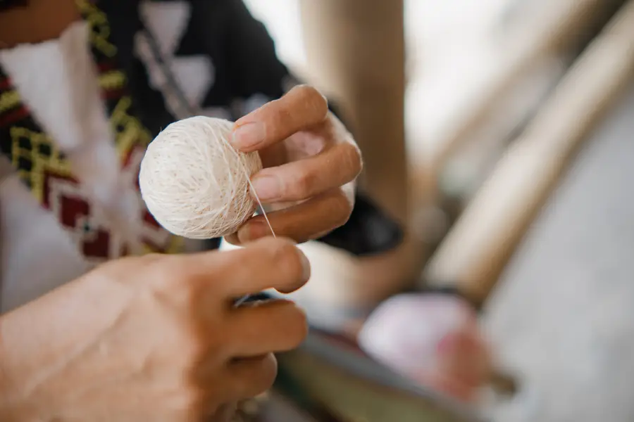 Winding the ball of thread