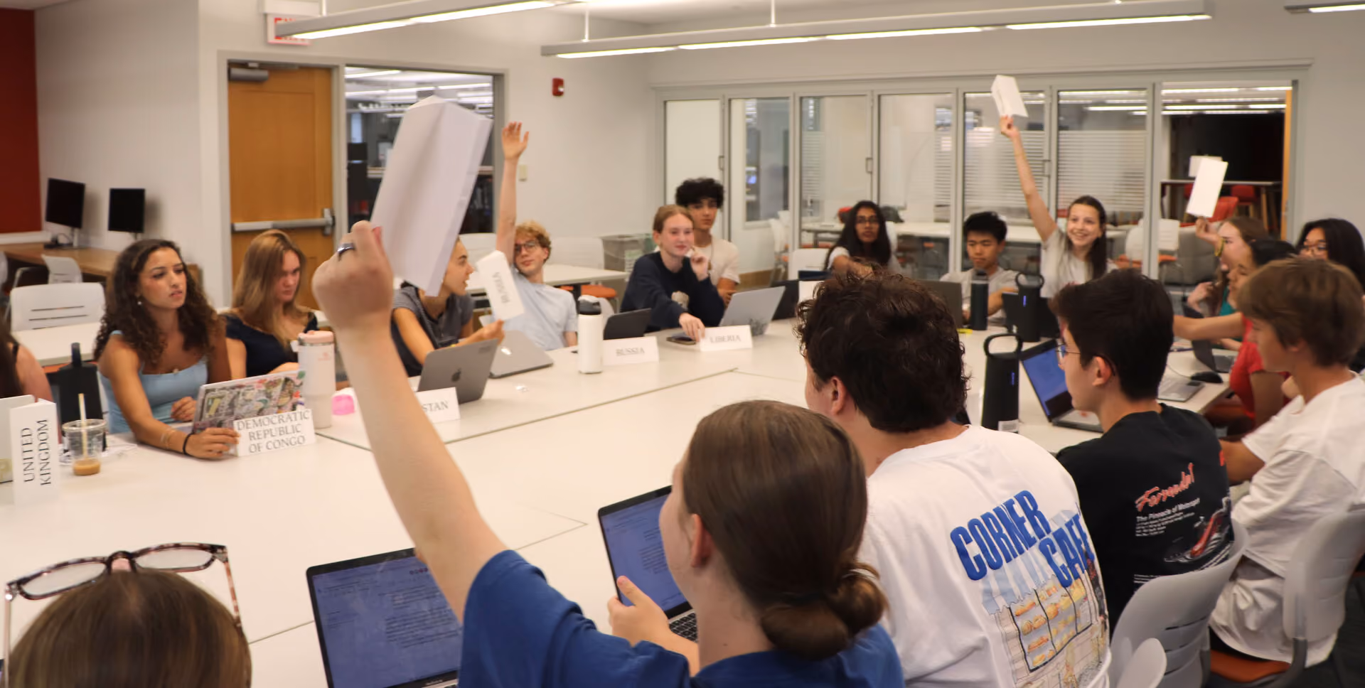 Summer Scholars students in the library stacks