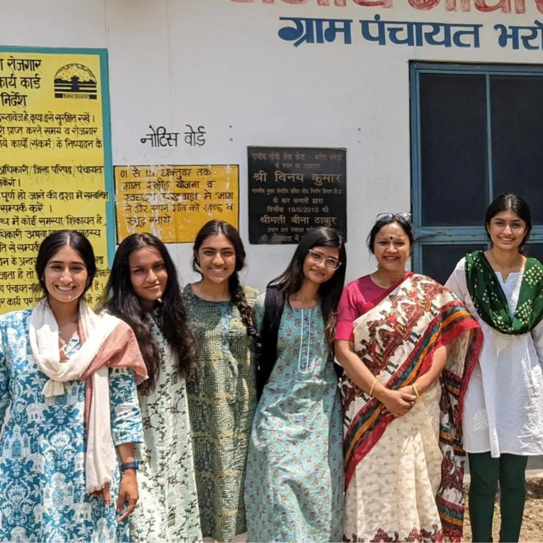 A smiling group of women and girls from Bharog Baneri following their Menstrual Health Management session with the students of UC Berkeley with the support of Pinkishe Foundation..