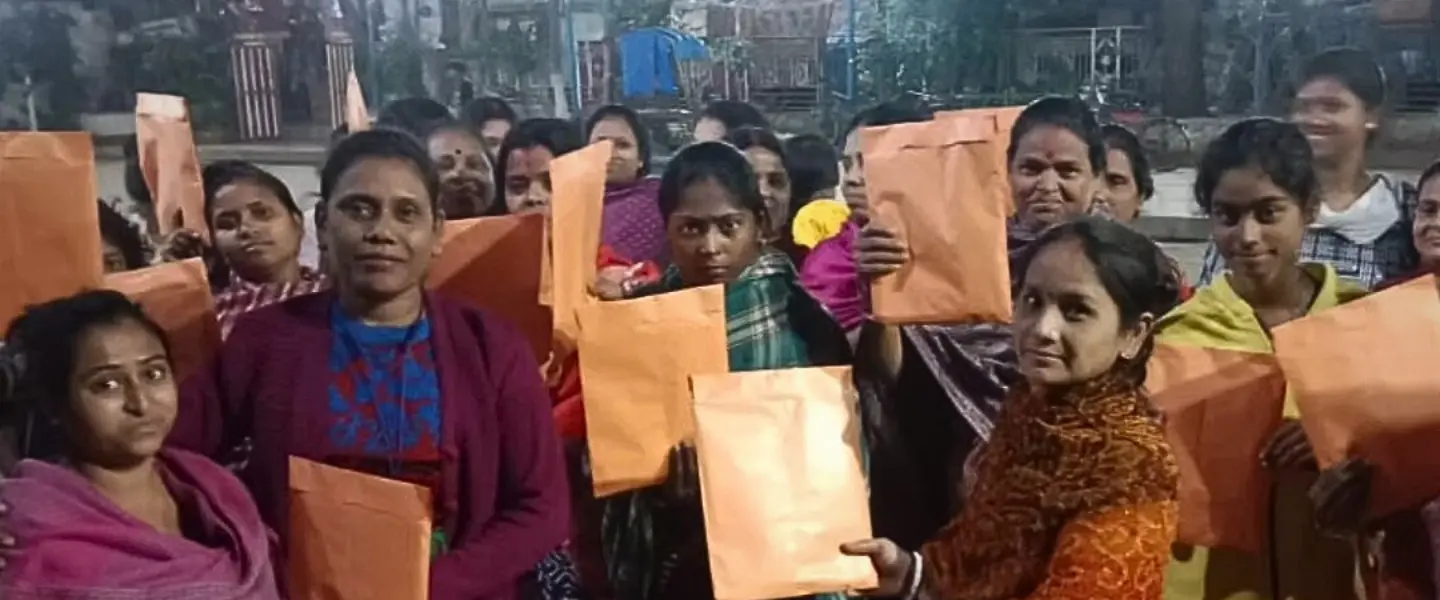 Girls in Indrapolly displaying the sanitary pads they received from Purnima’s initiative to combat menstrual stigma.