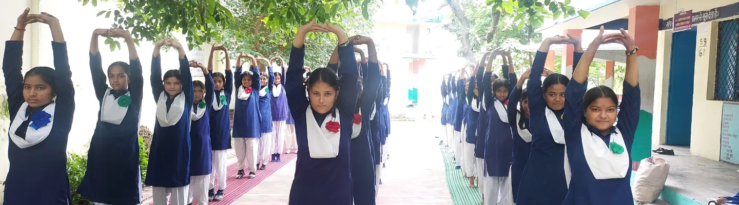 Girls at the menstrual hygiene session organized by the Pinkishe Foundation in Haldwani , smiling with confidence after an empowering session led by Upasana, where they learned about menstrual health and sustainable practices.