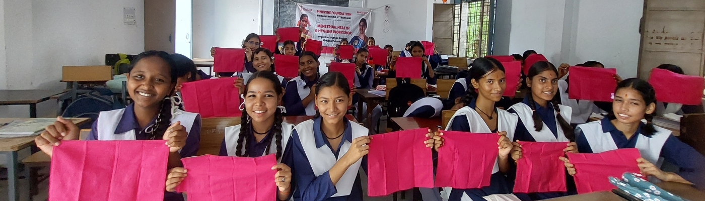 Upasana Tulera leading a discussion on menstrual health and hygiene at a community-focused educational camp in Haldwani, Nainital, organized by Pinkishe Foundation.