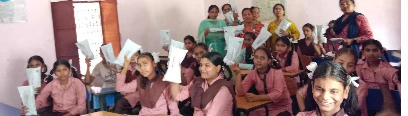 Community members receiving menstrual education and support from Pinkishe Foundation to enhance their understanding and management of menstruation.