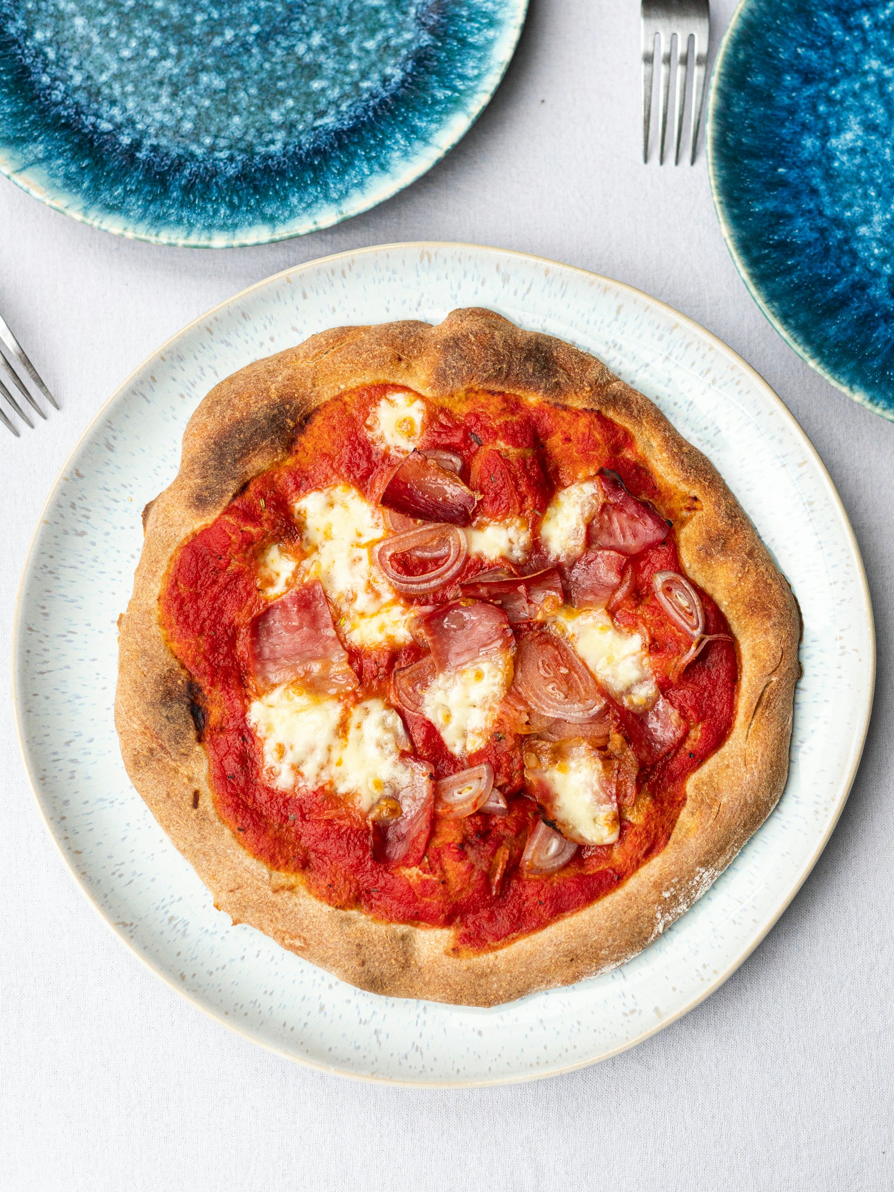 Prosciutto e Funghi met ham en champignons