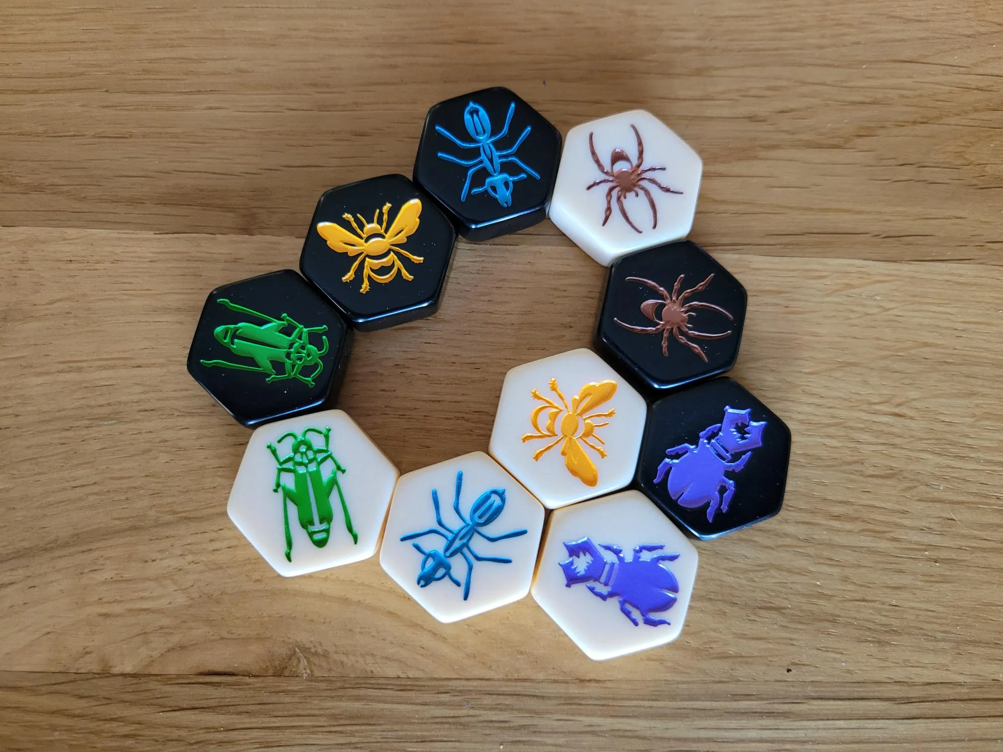 Hive Pocket two-player game tiles in play on a table