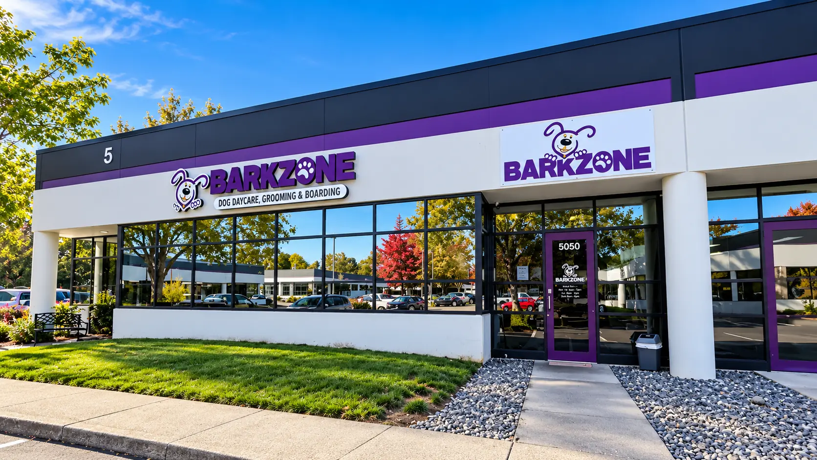 BarkZone Bethany storefront in Building 5 with purple BarkZone signs and the Suite 5050 entrance