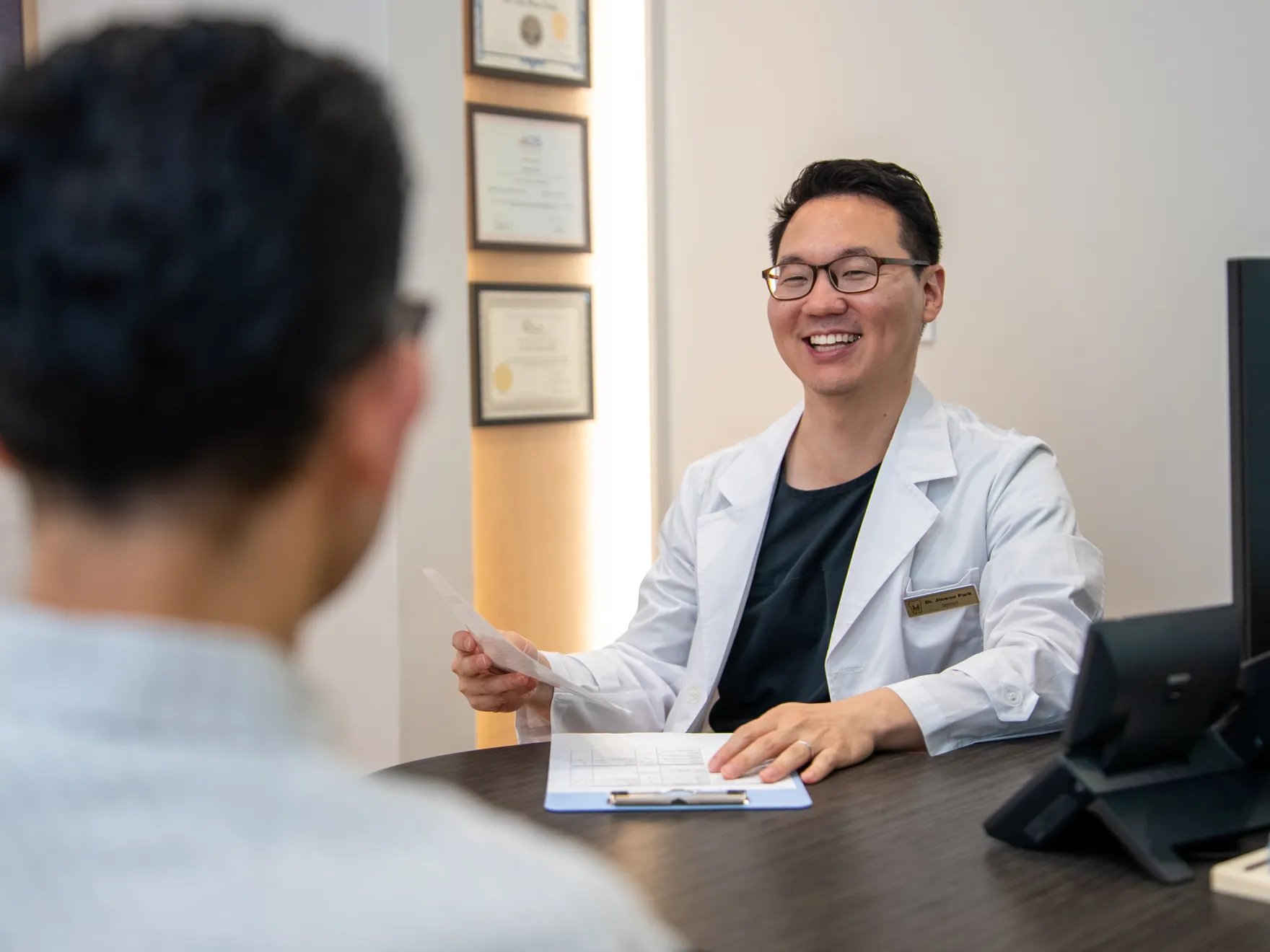 Dr. Park and patient at Hi Value Dental, Corinth, TX