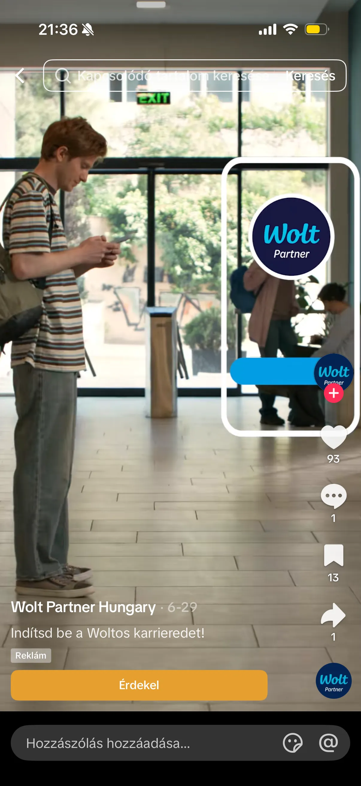 A shopper in a store with a product card overlaid on the video