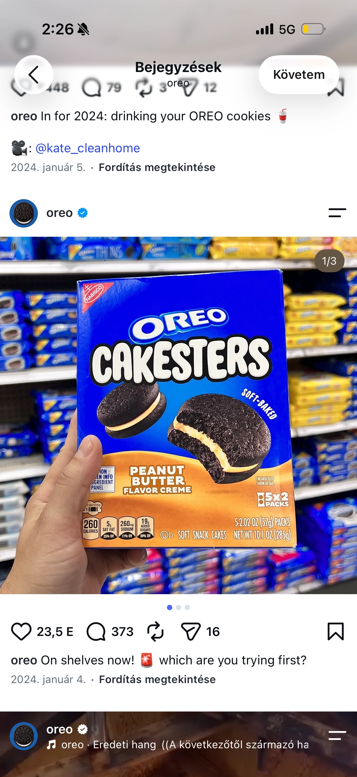 Instagram post: a hand holding a pack of Oreo Cakesters on a city street