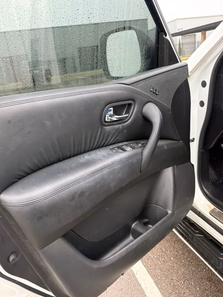 Dusty door panel before an interior car detail