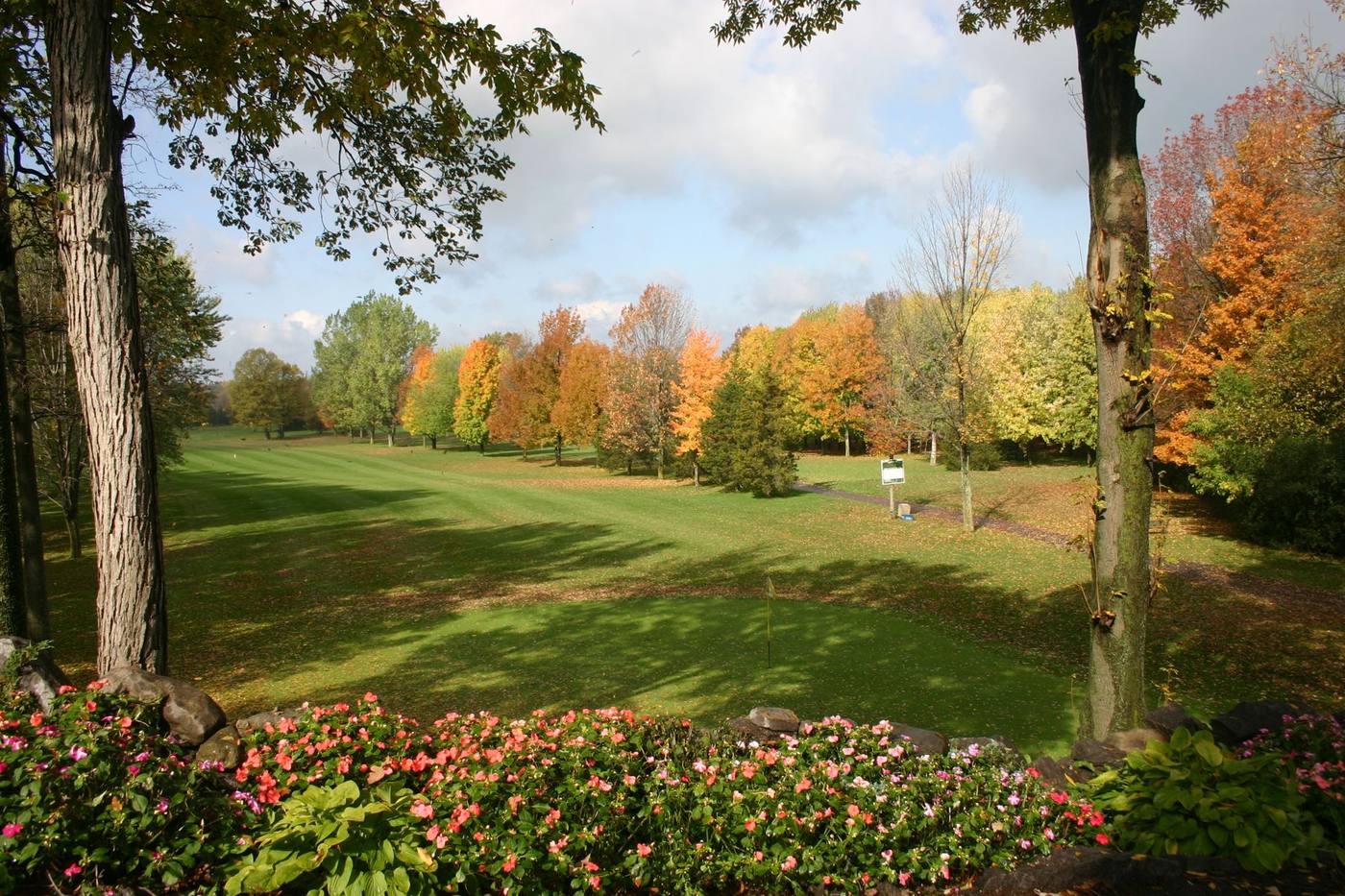 The practice putting green beside the clubhouse