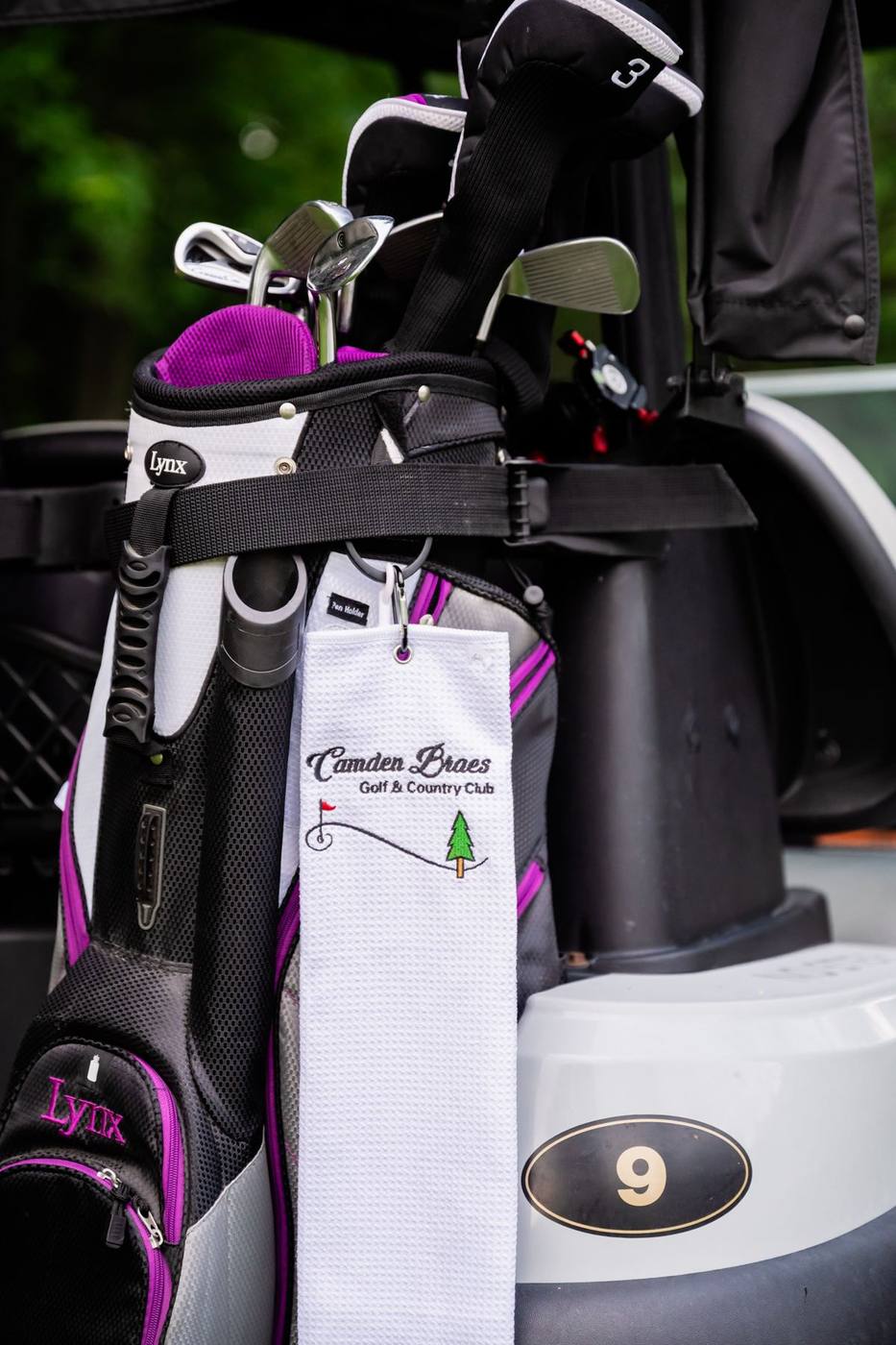 Irons in a golf bag, ready for new grips