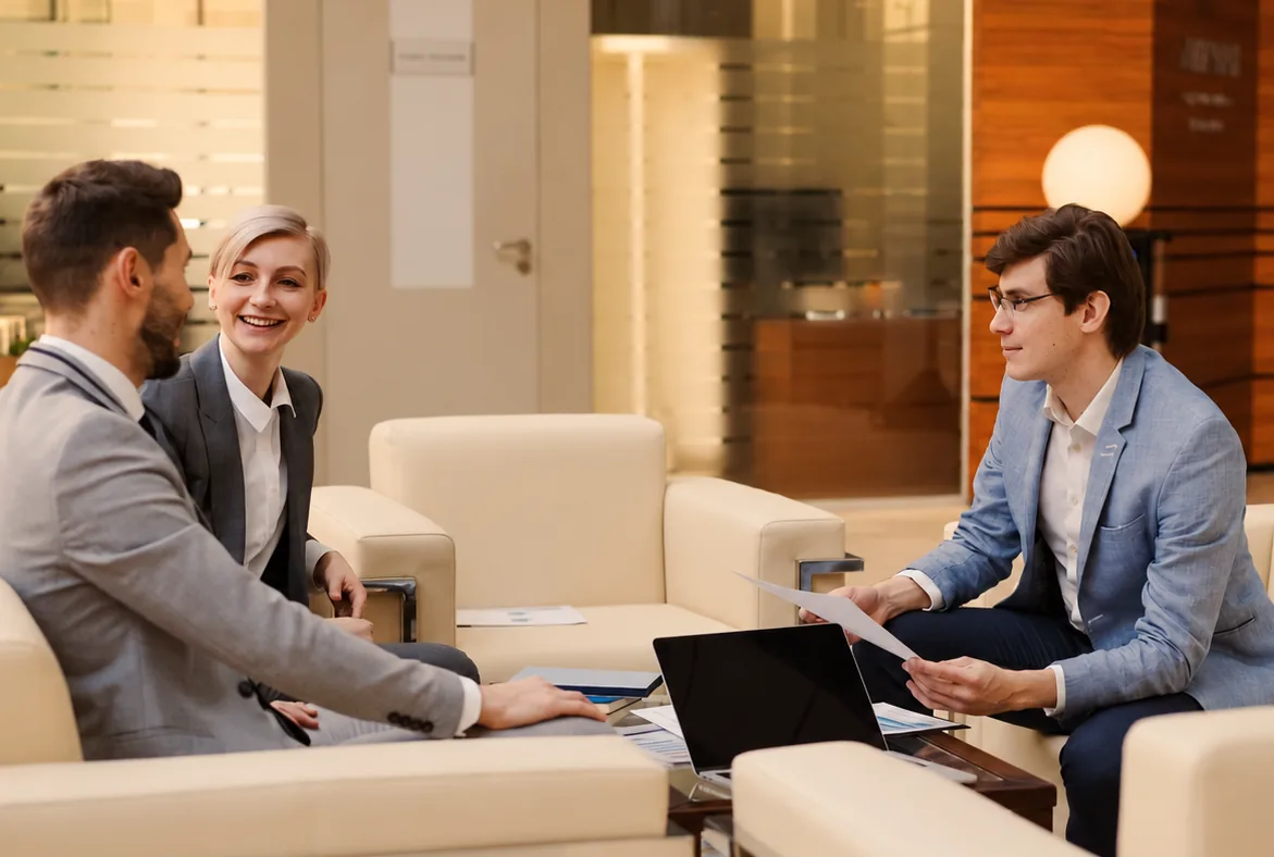 A member waiting in a quiet office lounge
