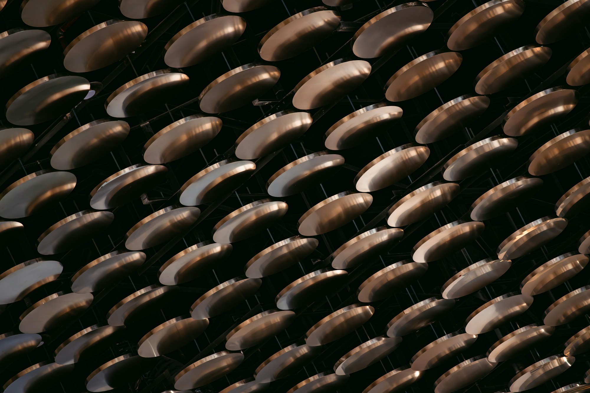 Abstract copper-toned artwork representing Quality Engineering & Test Assurance.