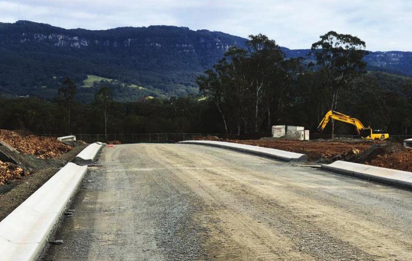Estate road with the Illawarra escarpment behind