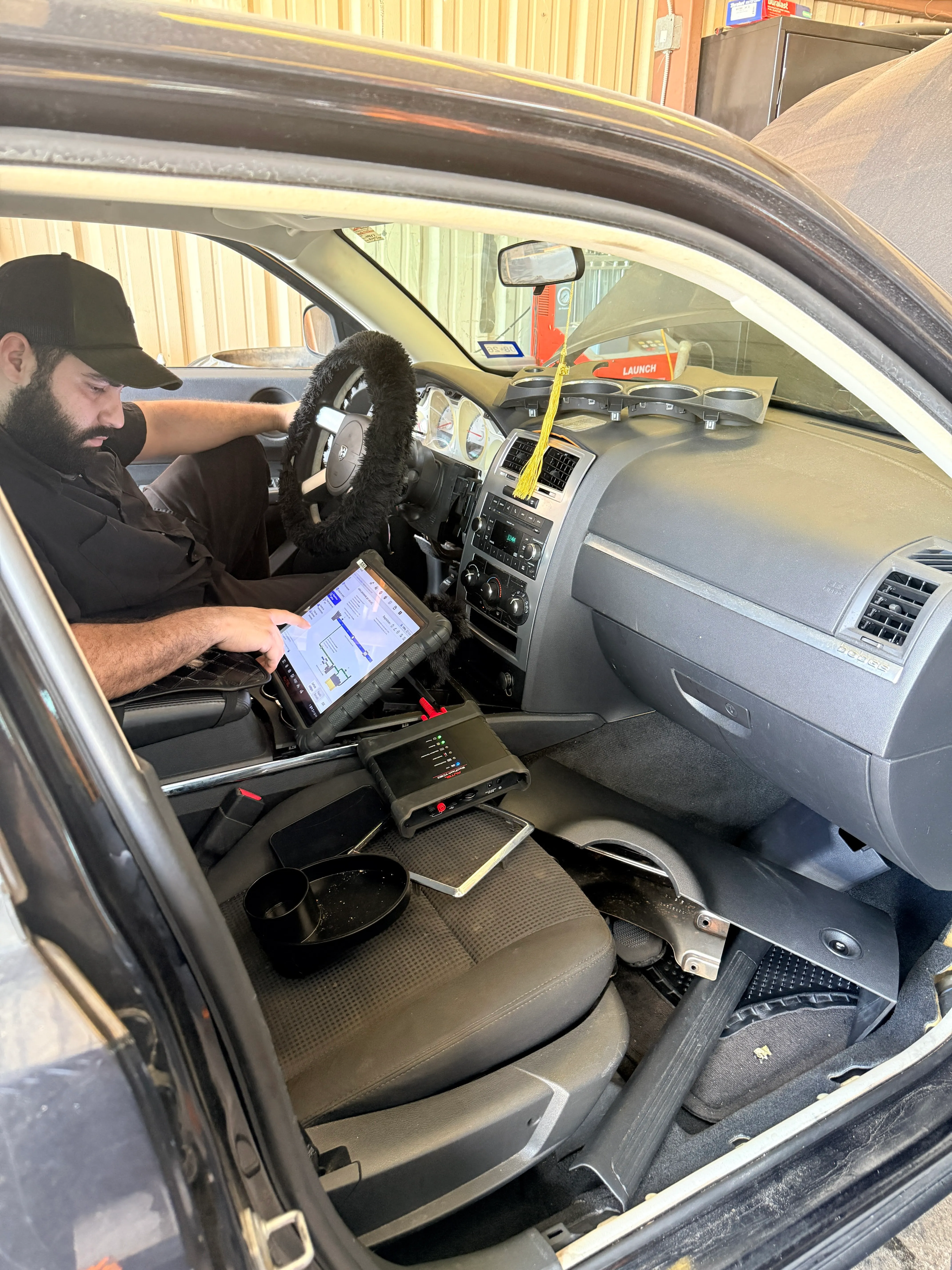 Autel automotive scan equipment in a vehicle at My Cypress Mechanic