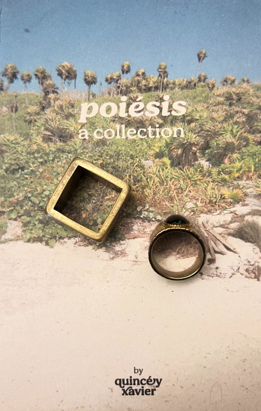 the cover of poiésis, a collection, by quincéy xavier: palms and scrub above pale sand, with two brass rings resting on it.