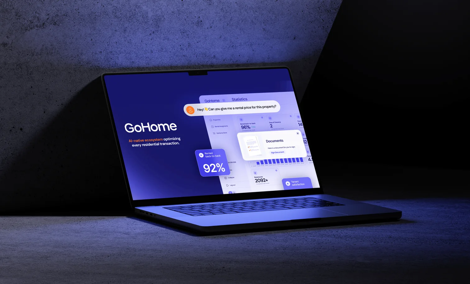 The GoHome platform open on a laptop in a dark studio