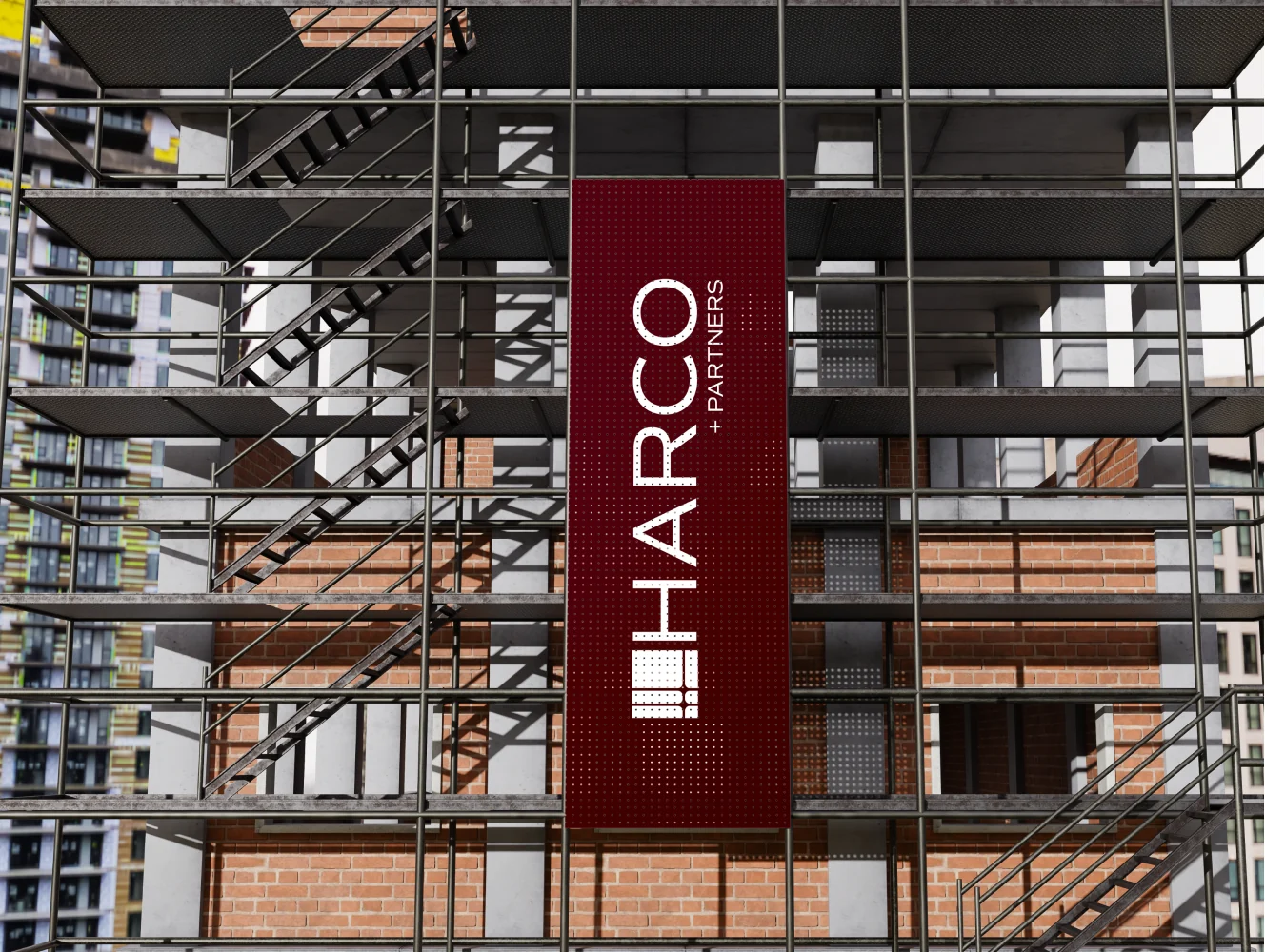 HARCO scaffold banner hung across a building under construction