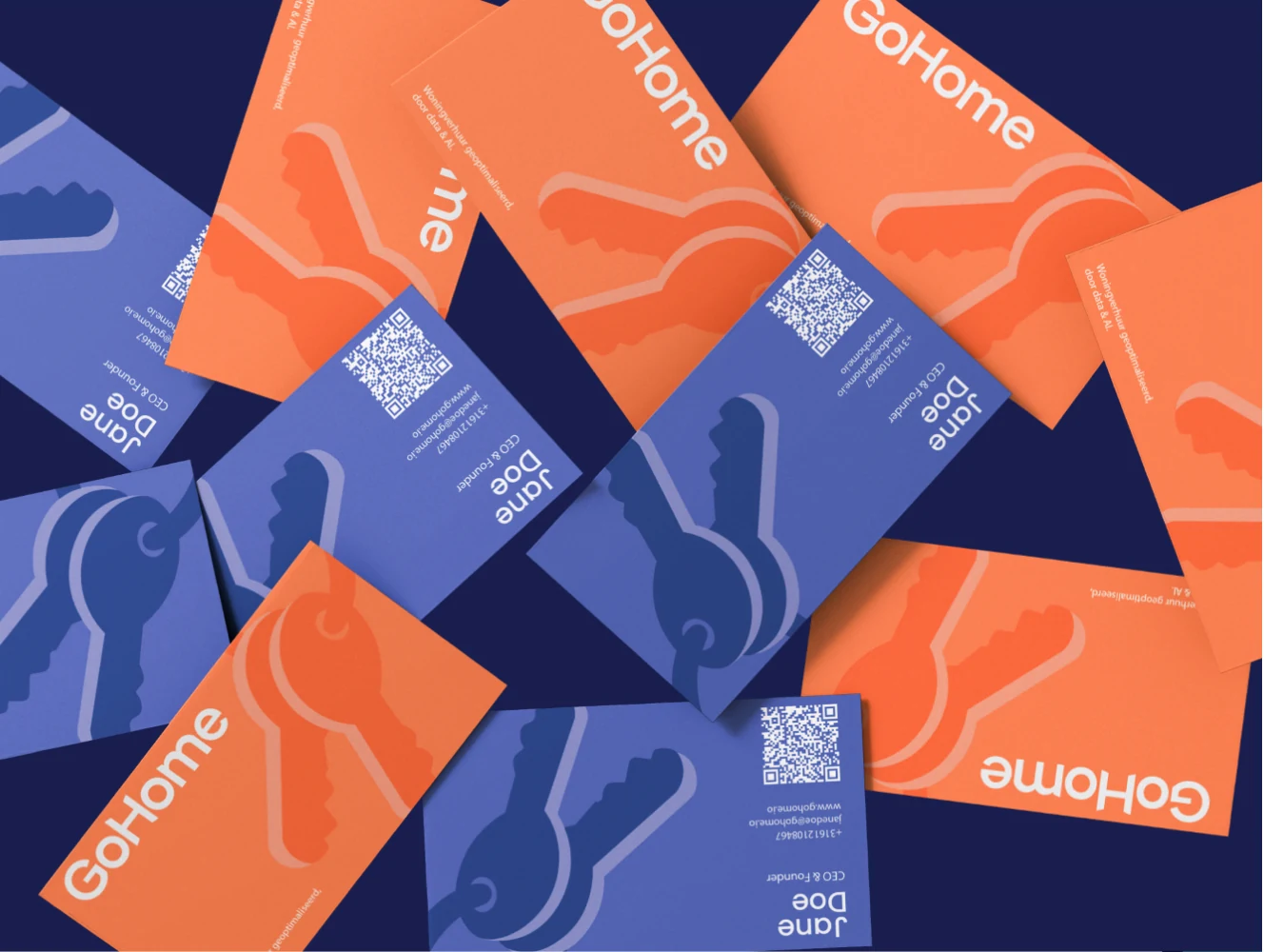Scattered GoHome business cards in violet and orange