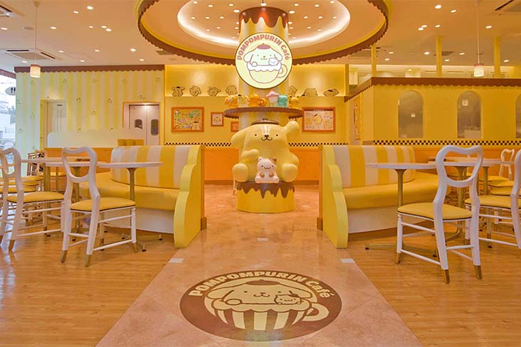 Food and decor at the Pompompurin Cafe in Tokyo
