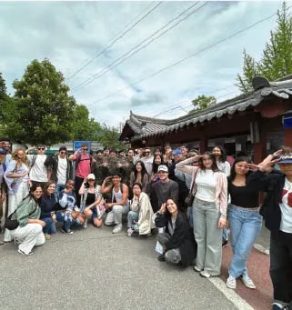 AIP interns at a traditional building