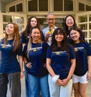 Interns in matching shirts