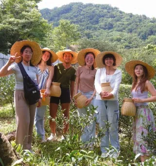 Interns in sun hats