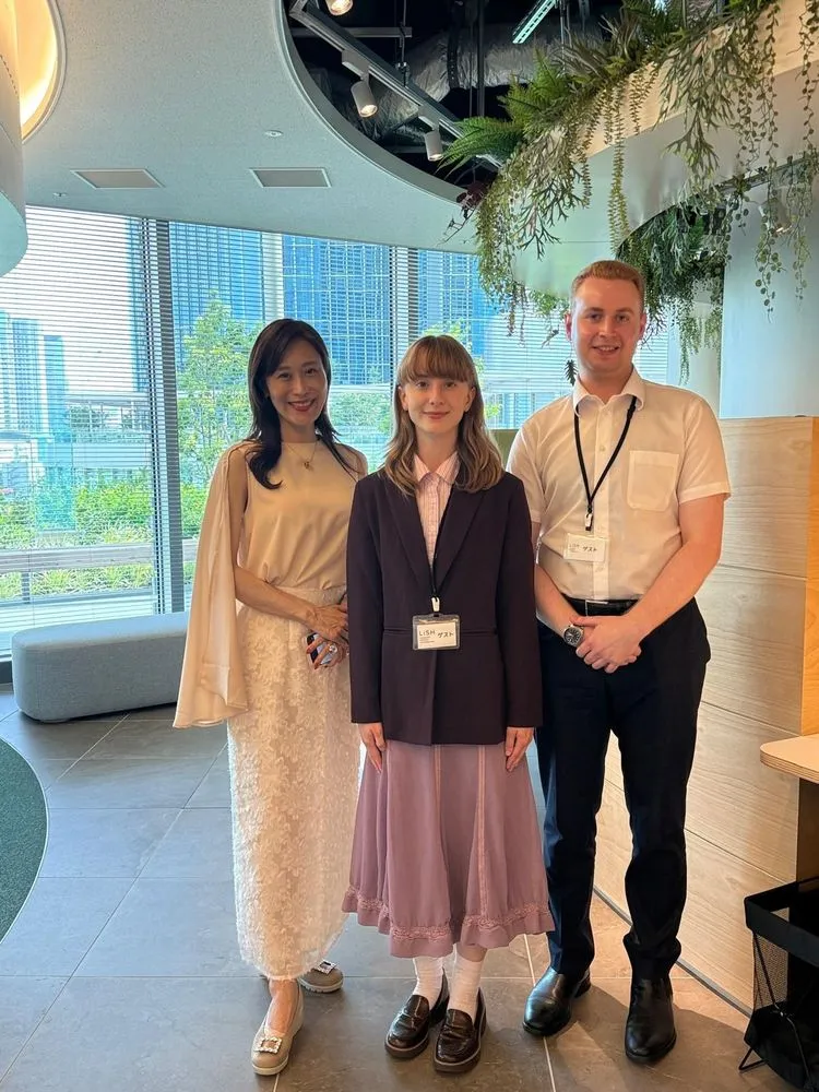 An AIP intern with her new colleagues on her first day at the office
