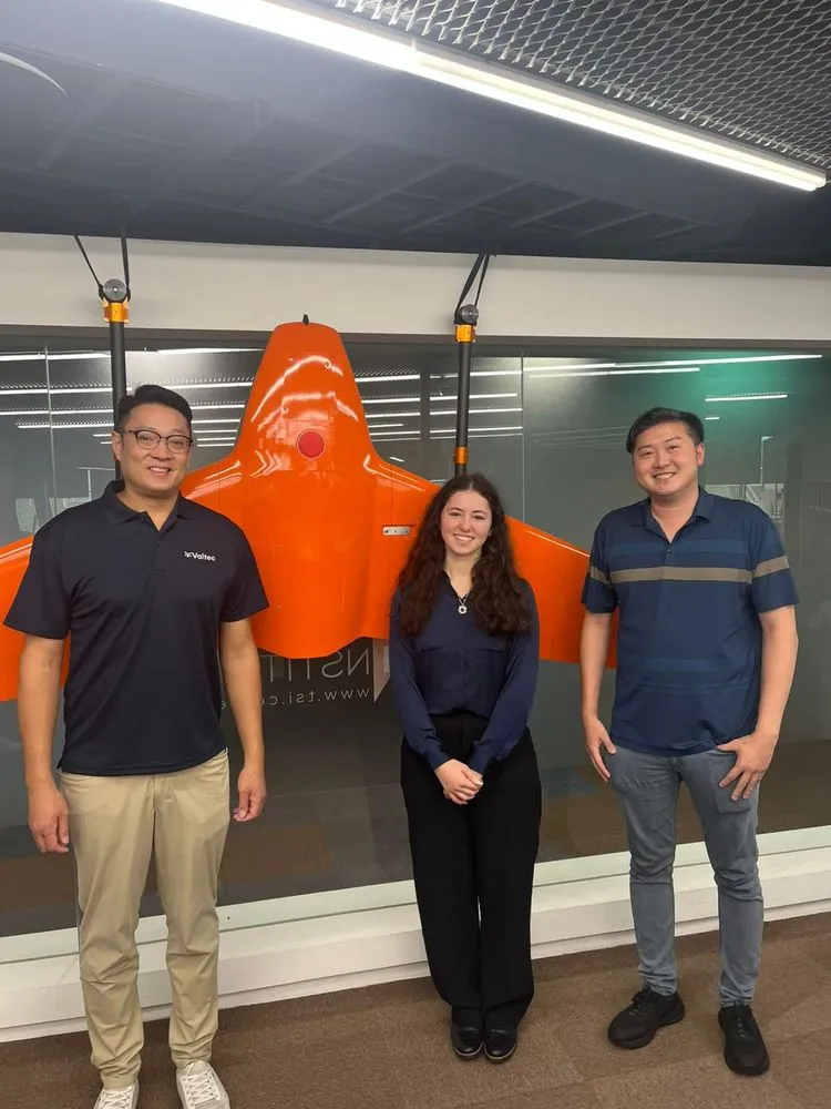 An AIP intern with her new team on her first day at a host company