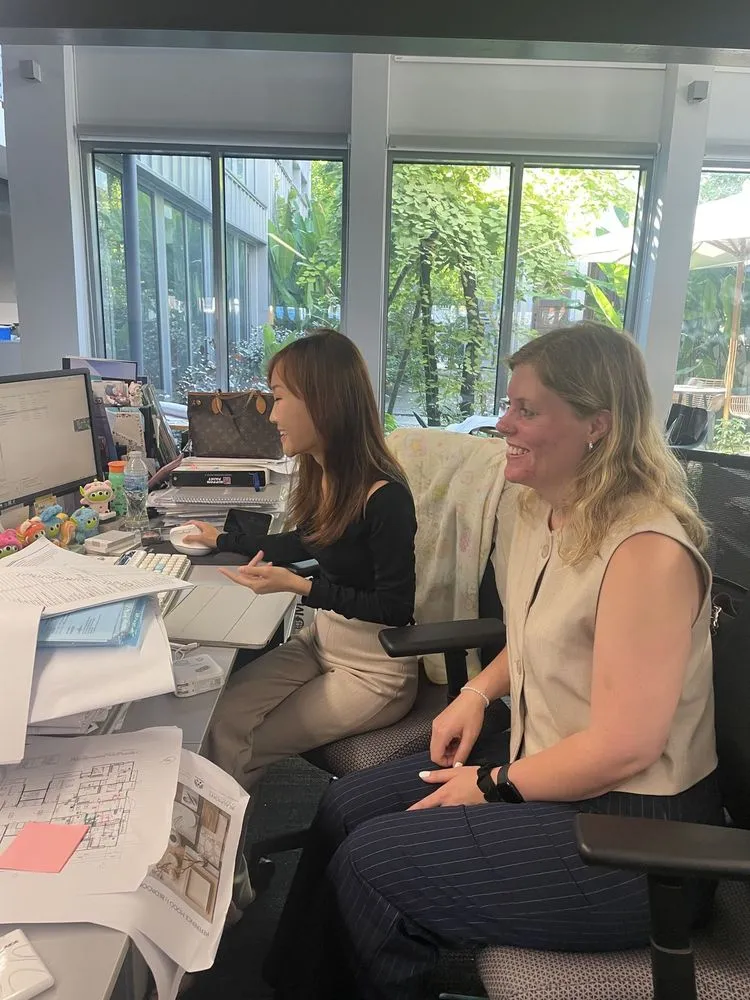 AIP interns working at their desks in an office