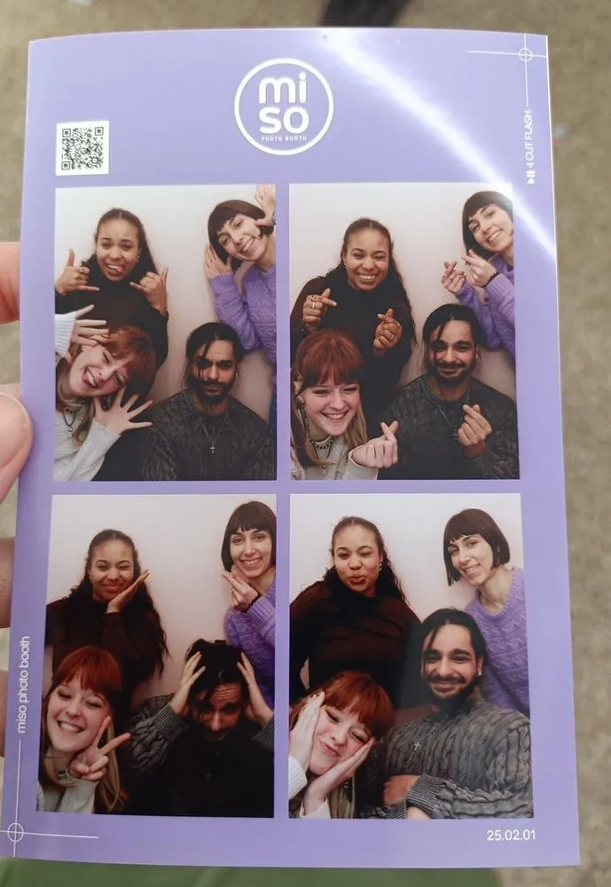 A photobooth strip of AIP interns pulling faces