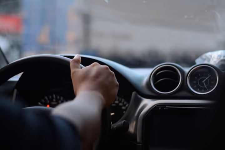 driver behind the wheel