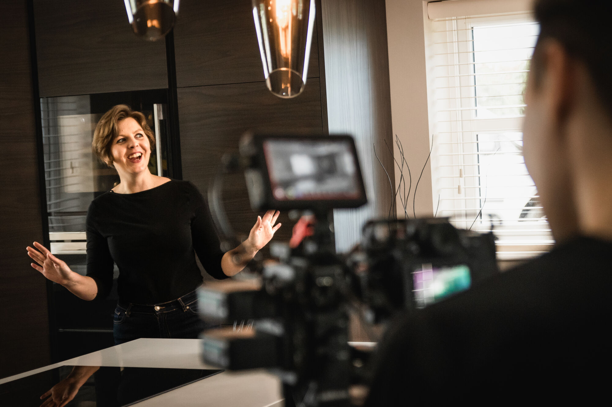 Two-camera shoot with a business owner