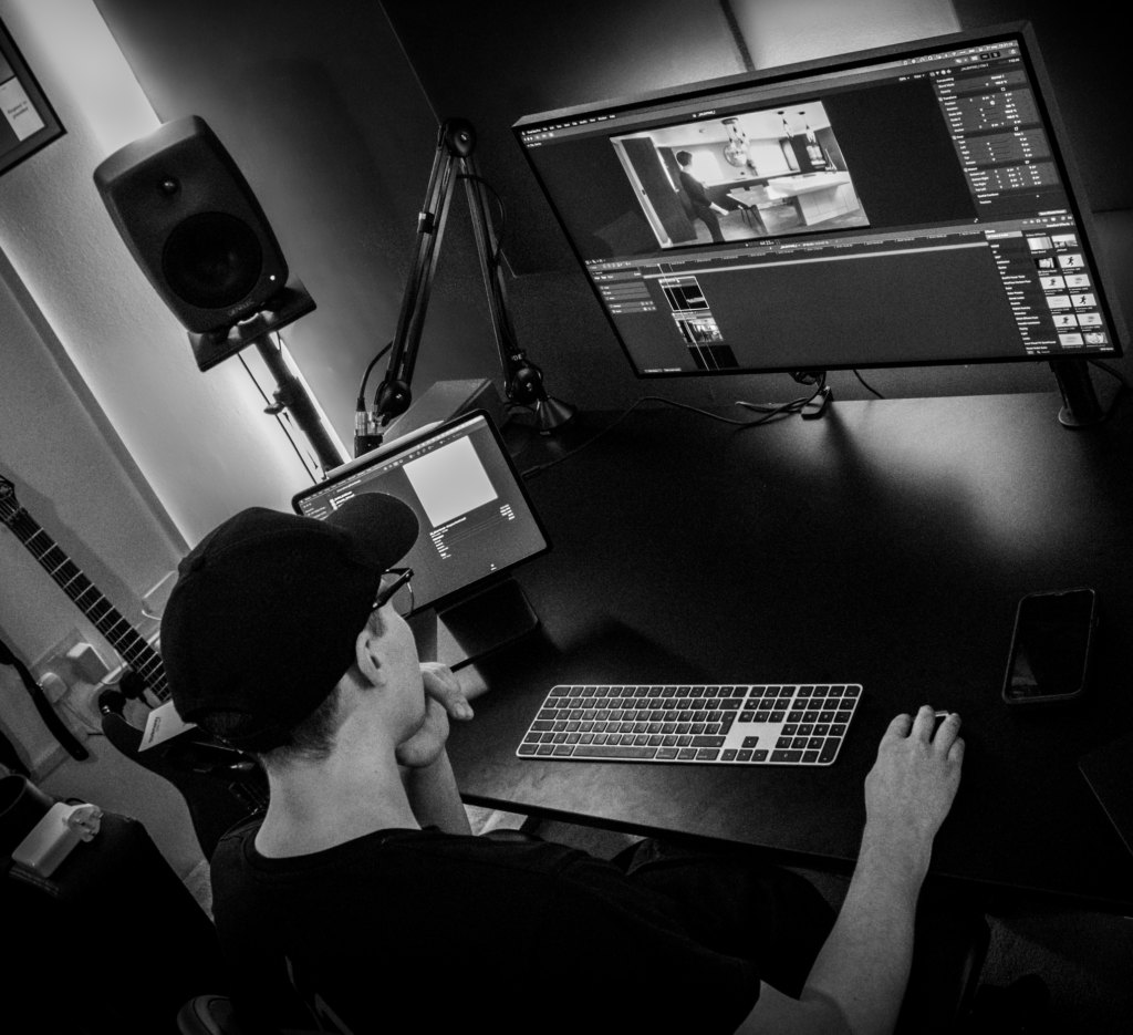 Harry editing a YouTube video