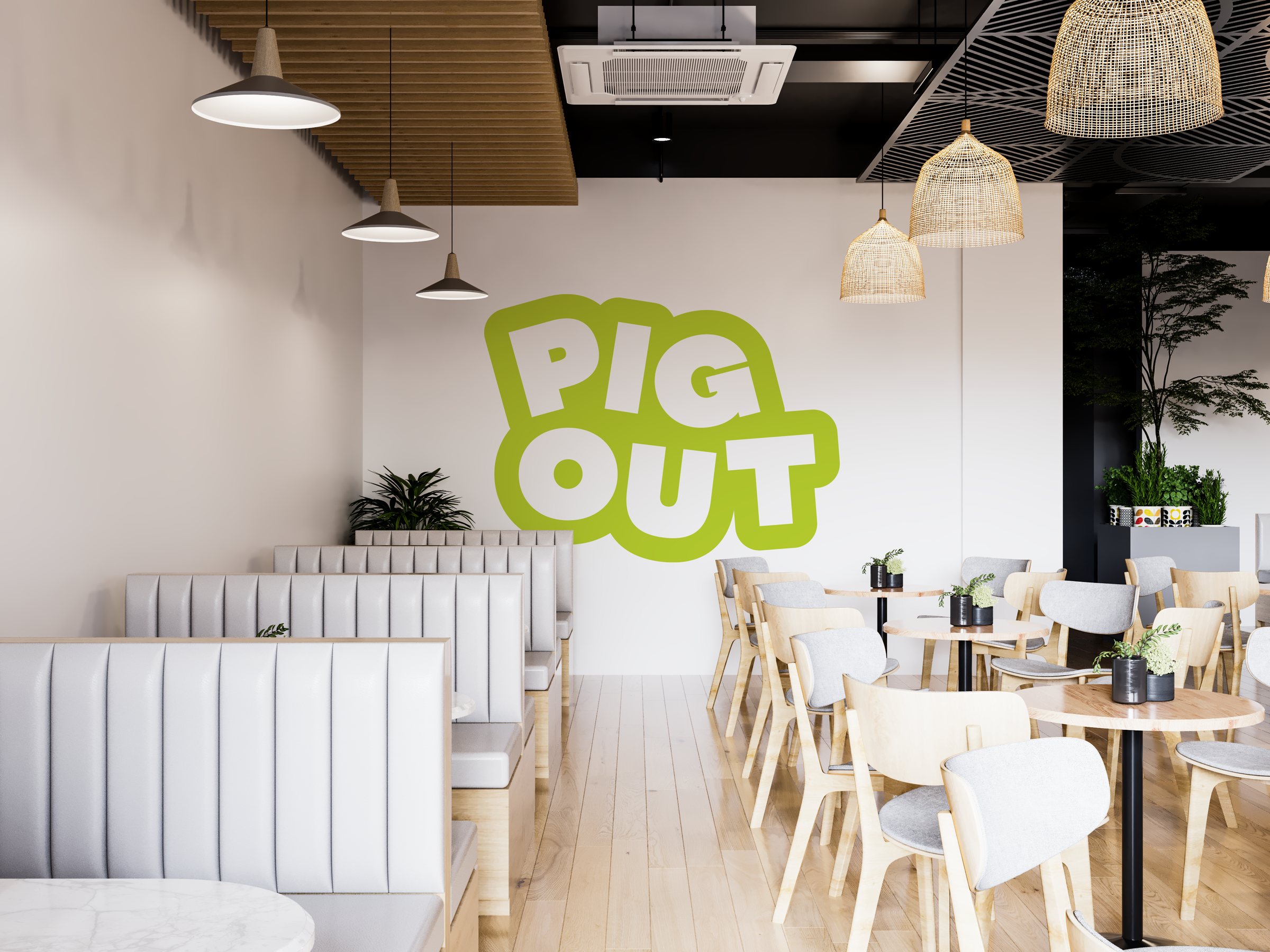 Pig Out restaurant interior with green logo wall graphic