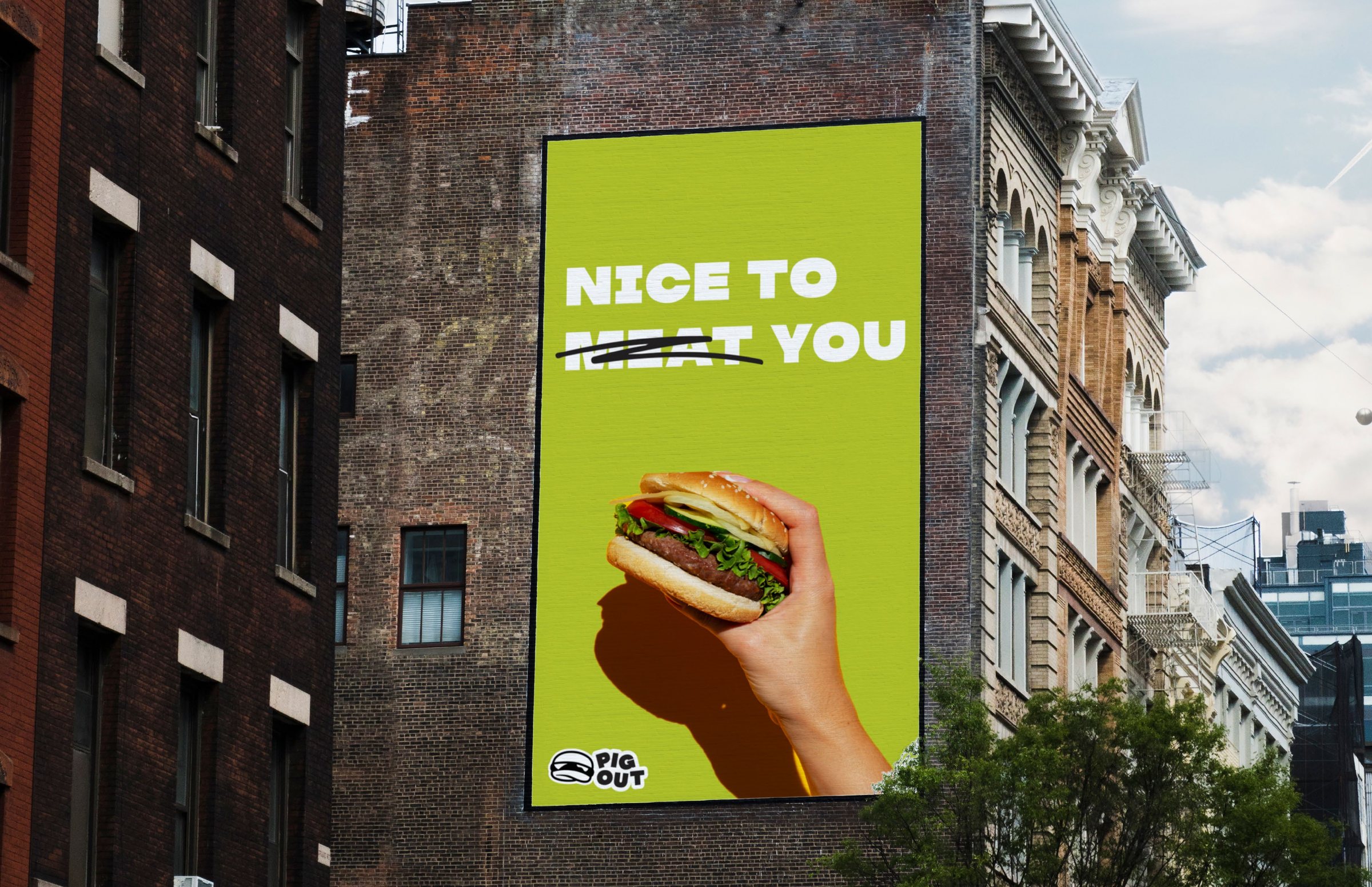 Pig Out building billboard reading Nice to meat you with meat crossed out