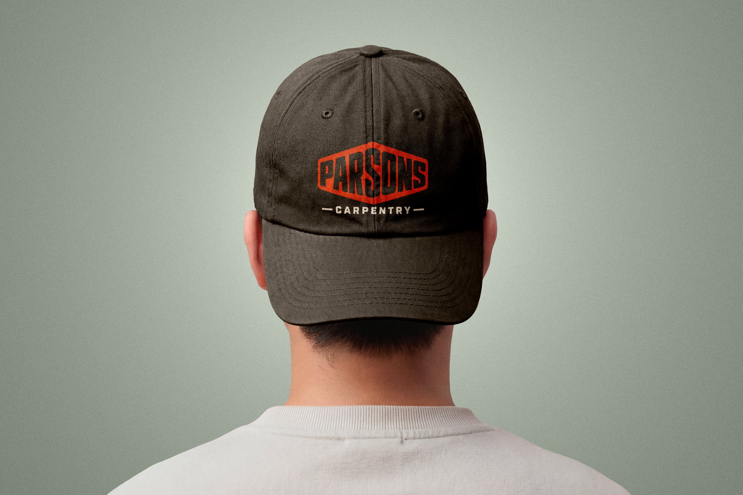 Parsons Carpentry logo embroidered on a black cap