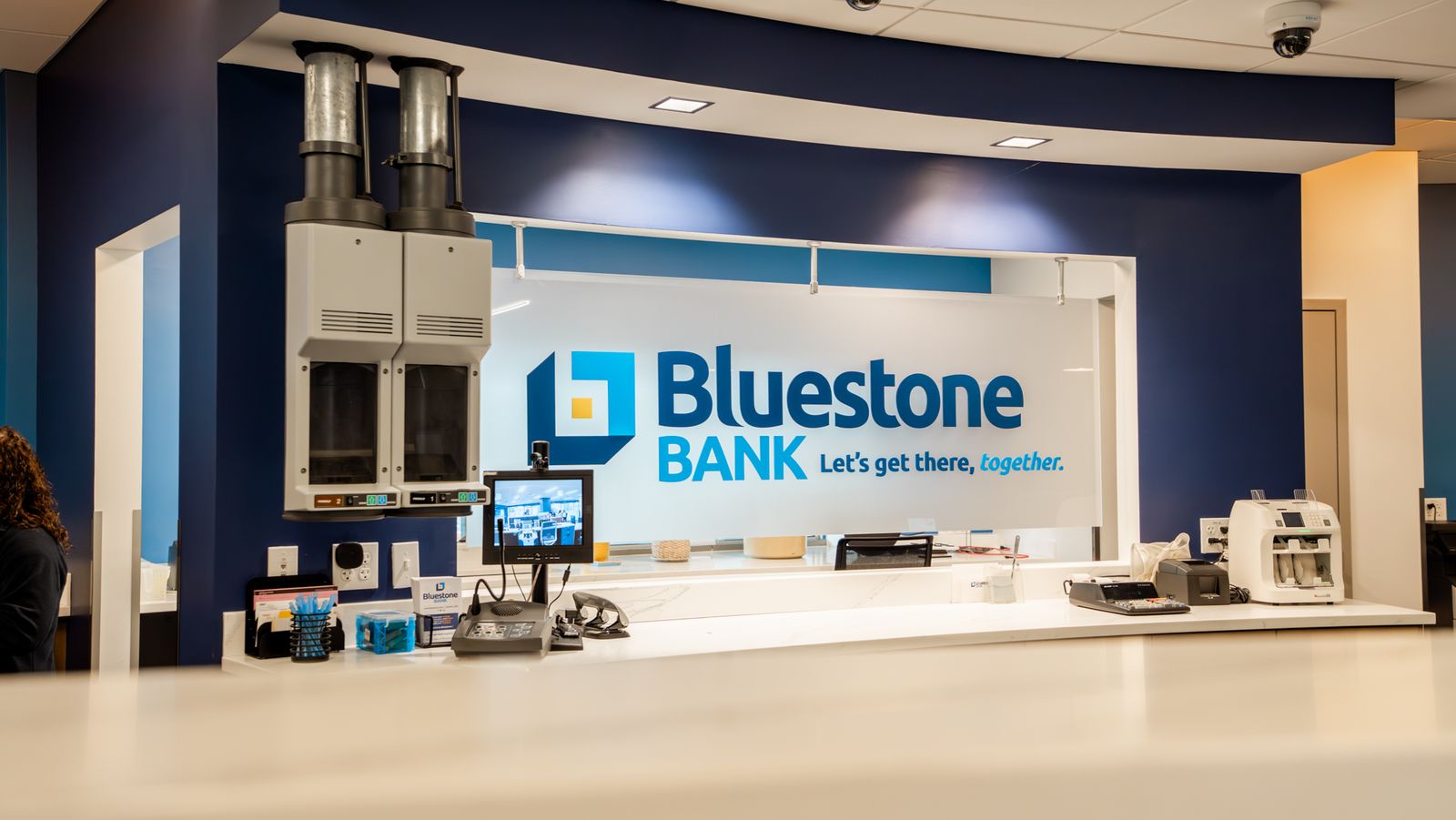 Bluestone Bank teller wall with dimensional logo