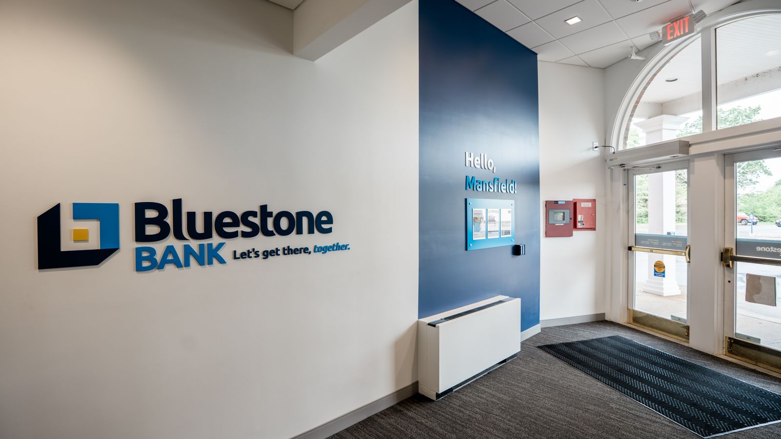 Bluestone Bank entry wall logo and Hello Mansfield focal wall