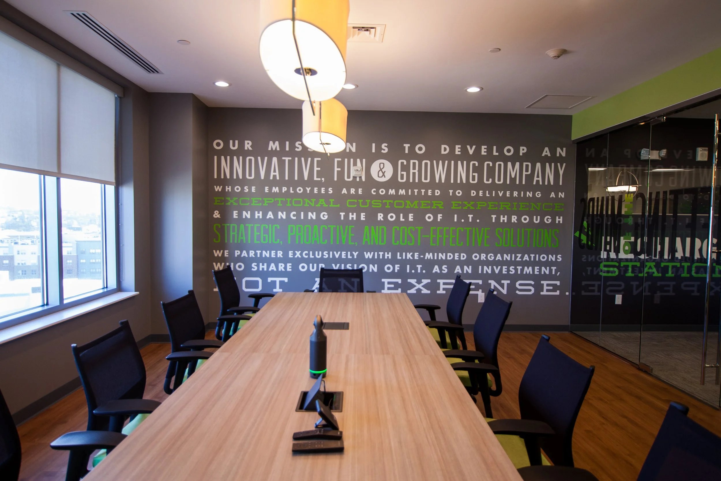 Paragus mission statement wall graphic in the conference room