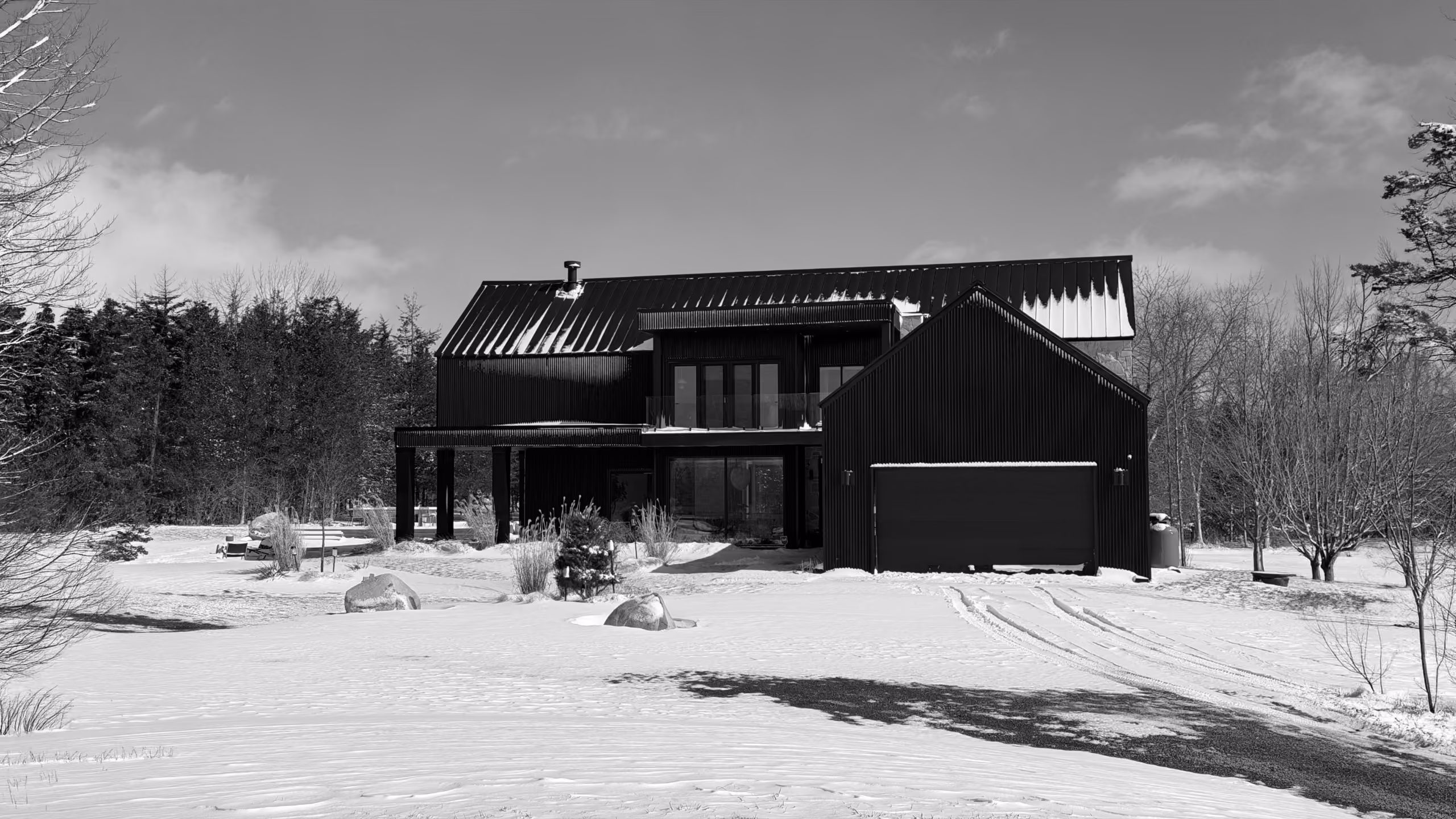 residential home built by Ducon featuring modern styling and black siding