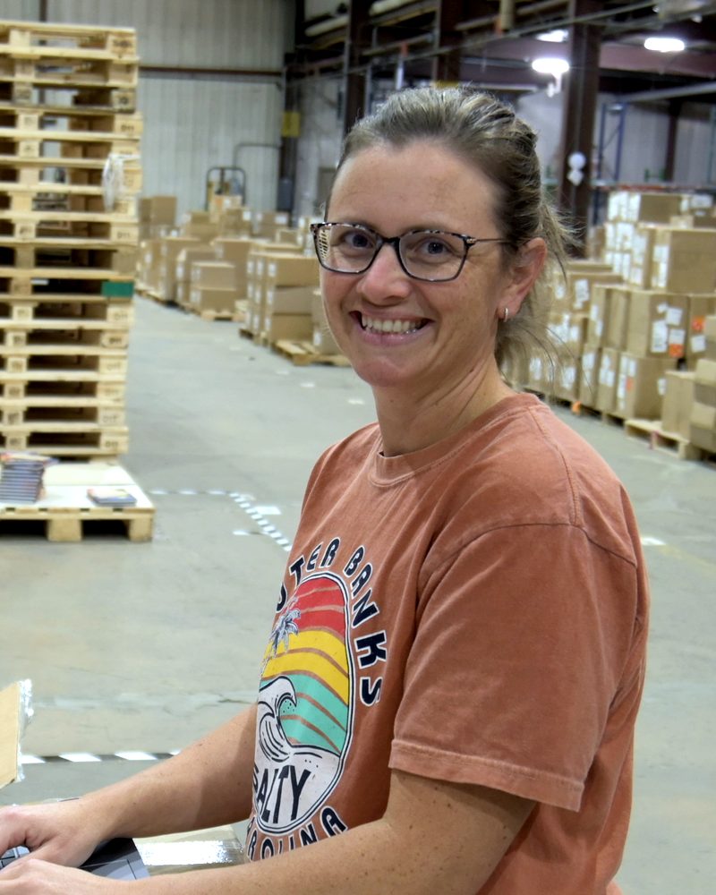 Kristen Clemmer, Account Manager, at work in the EcoShip warehouse