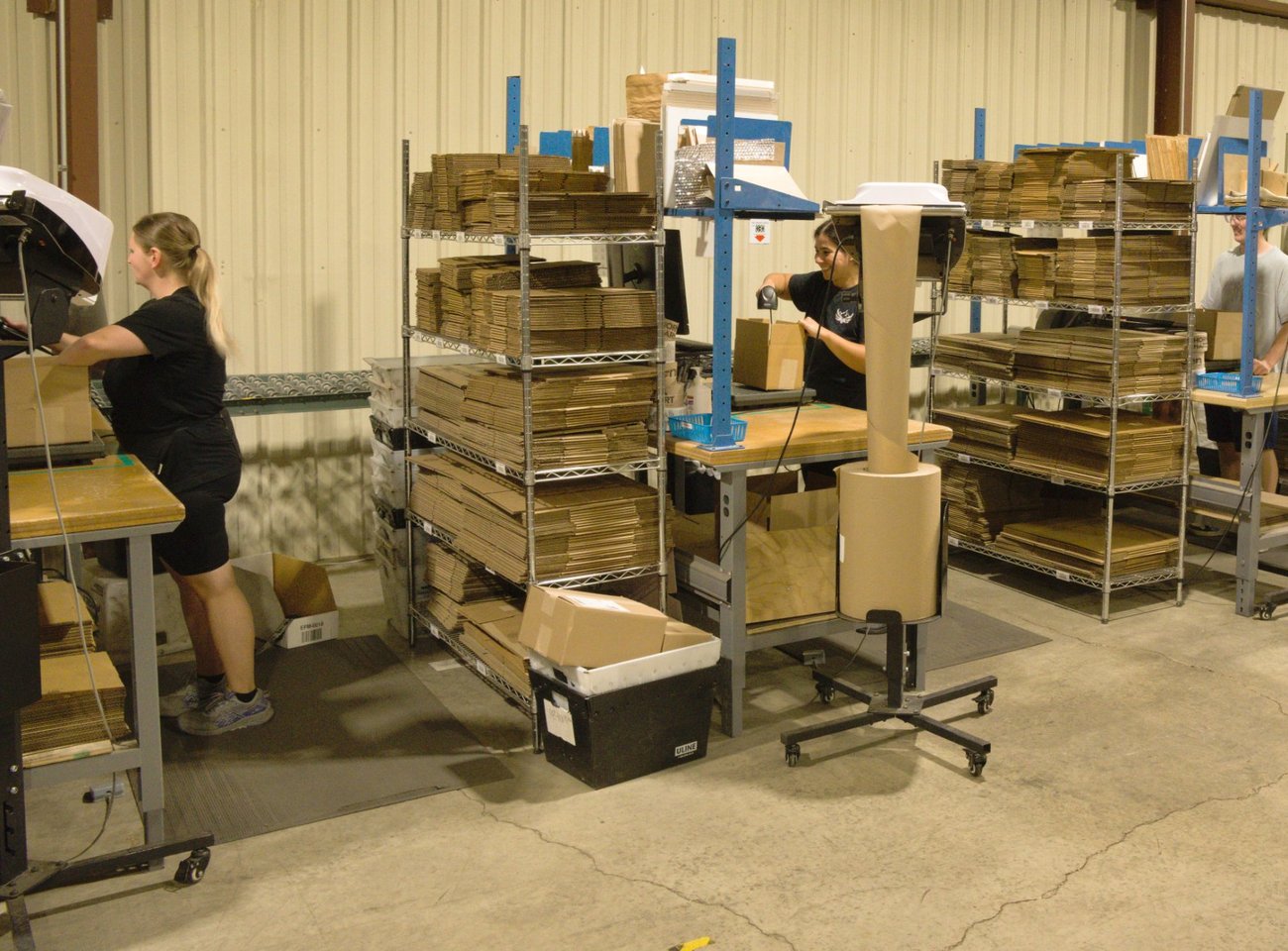 EcoShip packers working at their packing stations