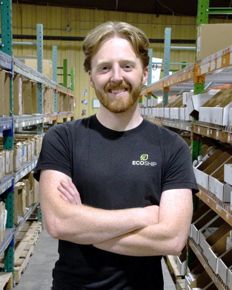 Jake Higley, CEO, leading the daily huddle at EcoShip