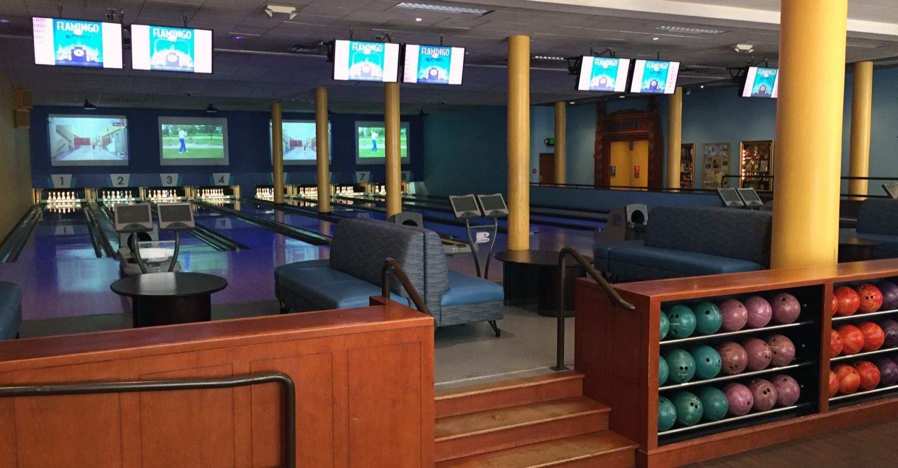 Wide view of the Main Room's lanes, lounge seating and bowling ball racks