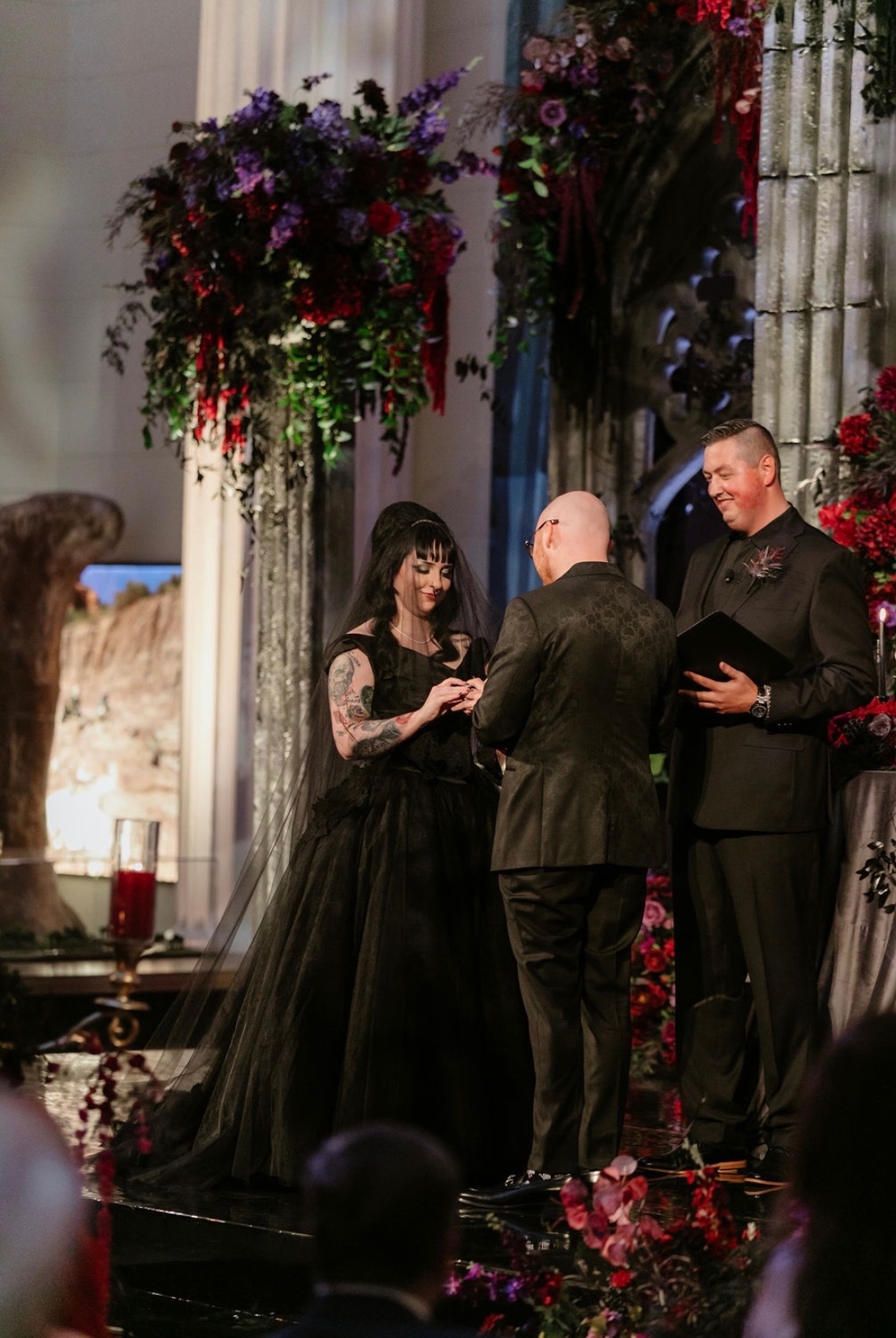 Dylan guiding a couple through their ceremony
