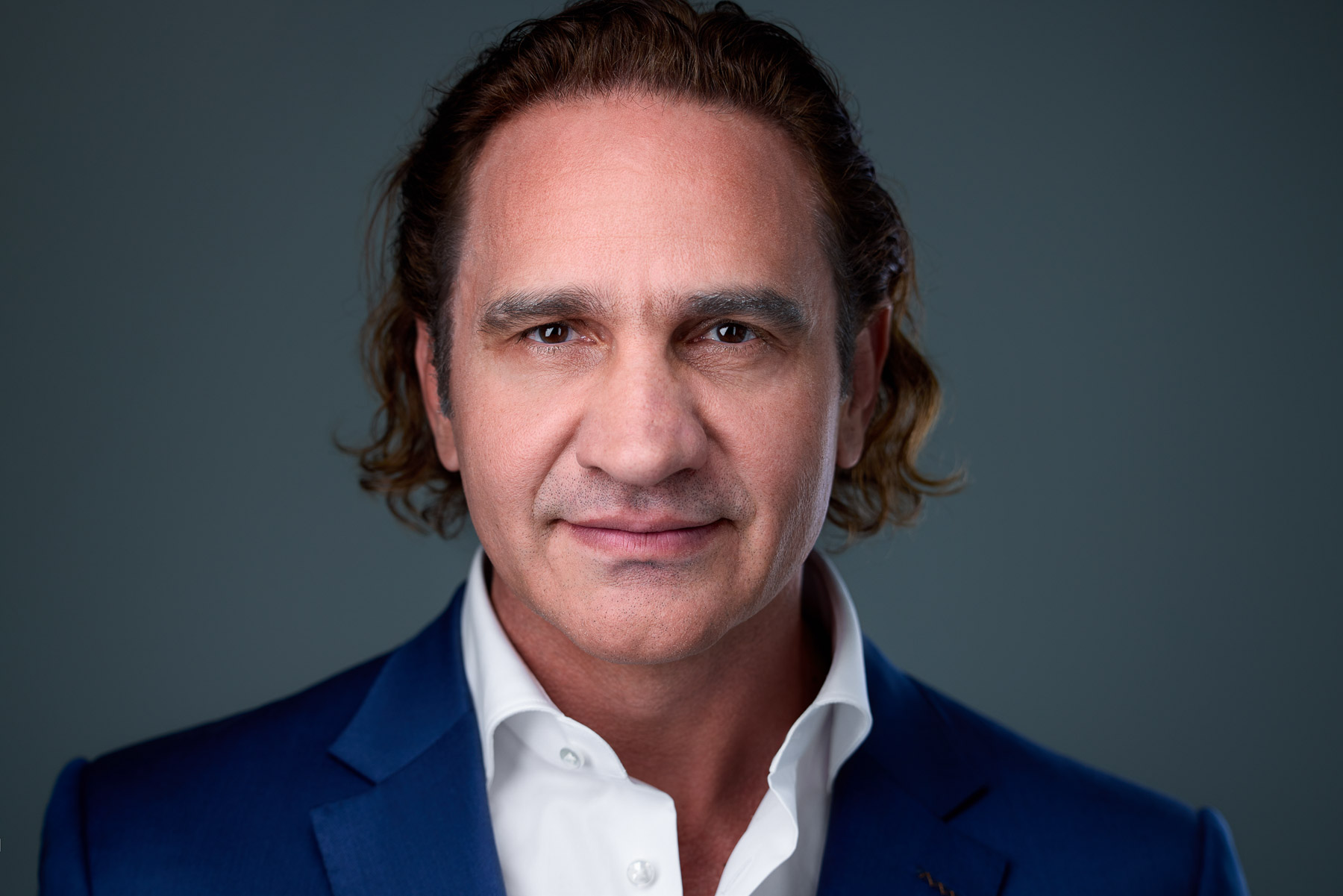 Juan Grobler formal portrait in a blue suit