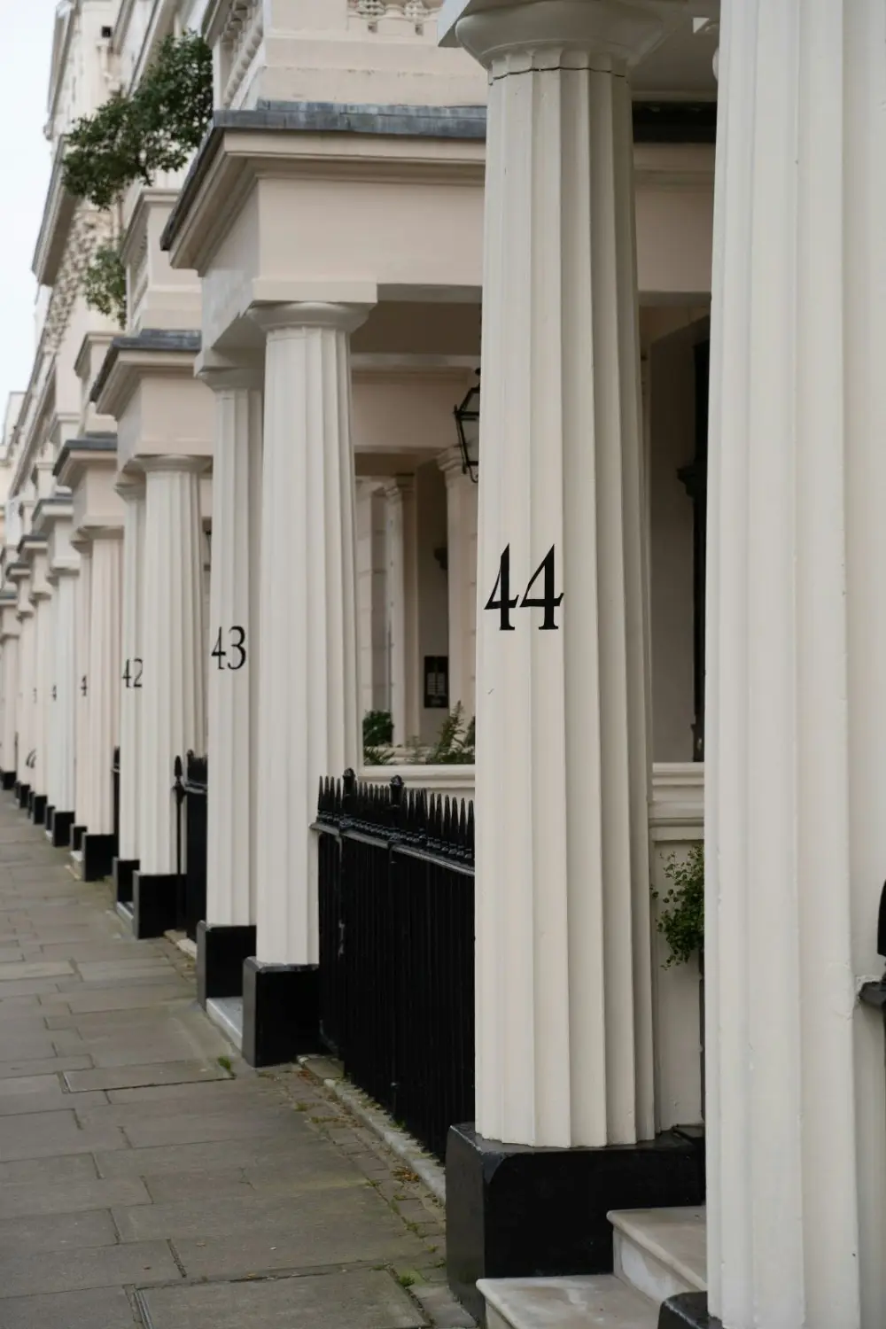 White stucco porticos along a Belgravia terrace