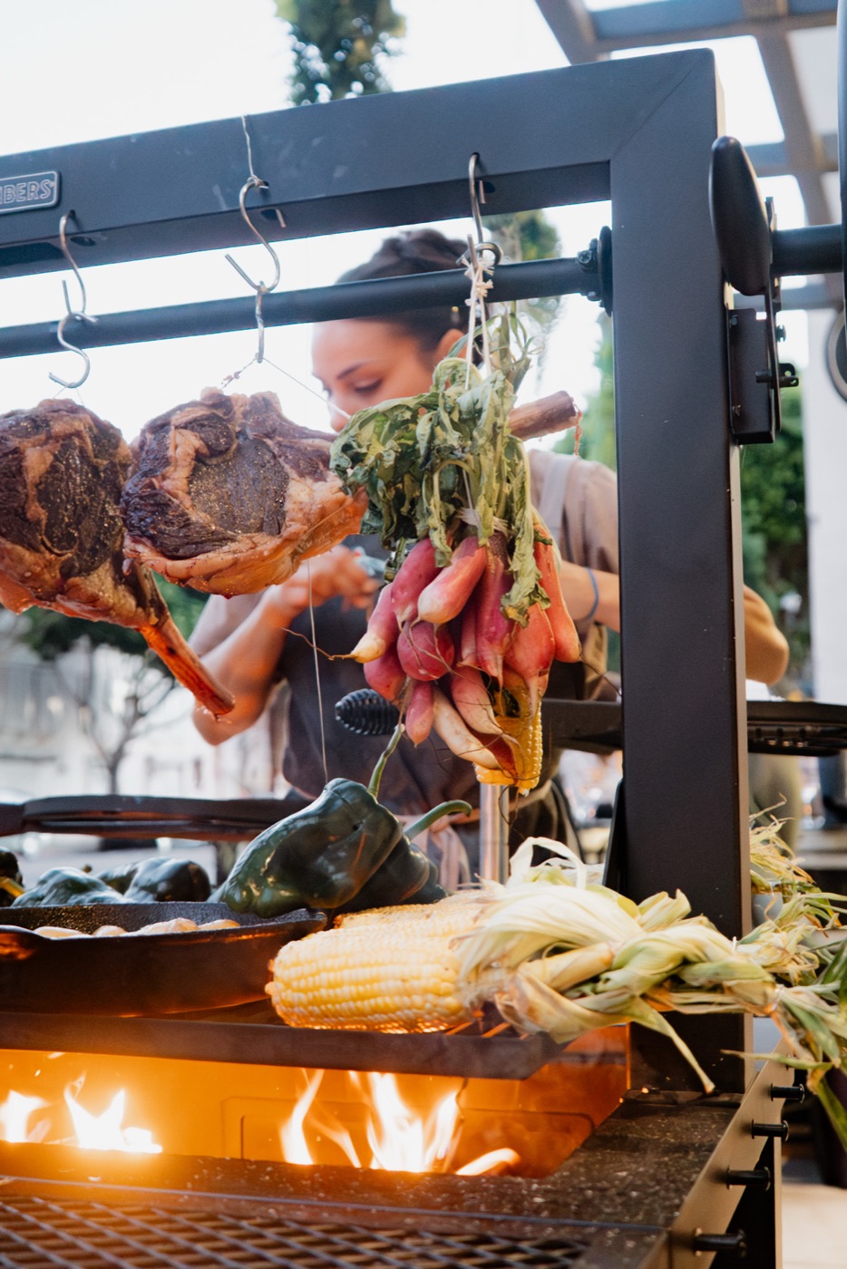 Radishes and meat hanging over the grill